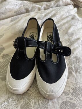 Vans womens Black Canvas Mary Jane Sneakers with White Soles